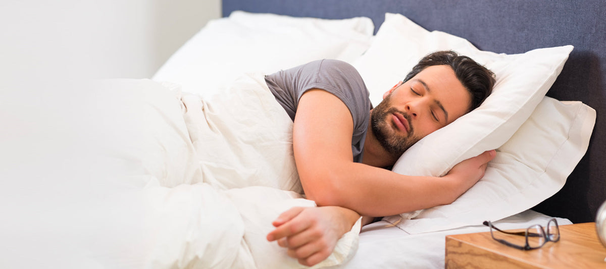 man sleeping on his left side