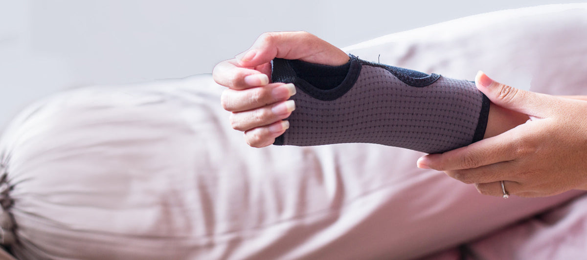 woman wearing hand brace to sleep