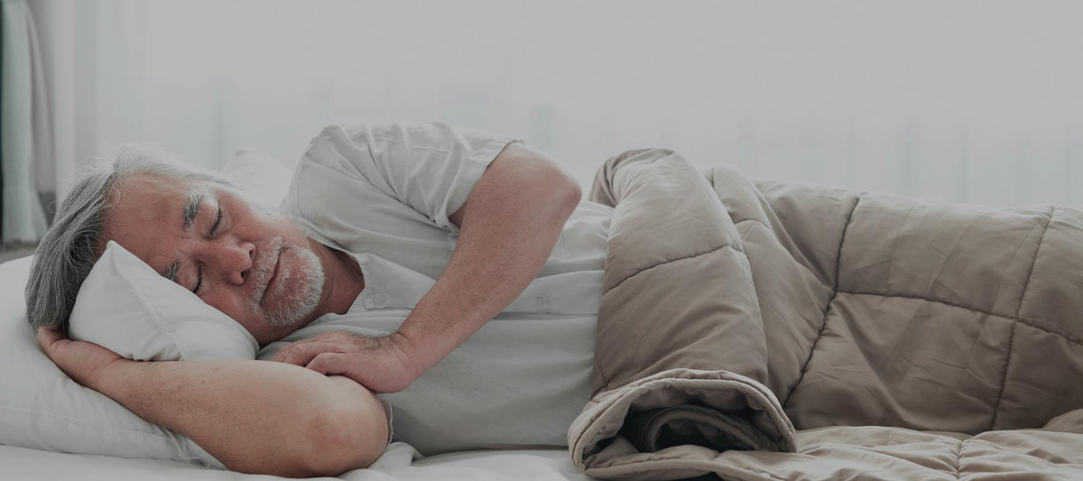 man peacefully sleeping on his side