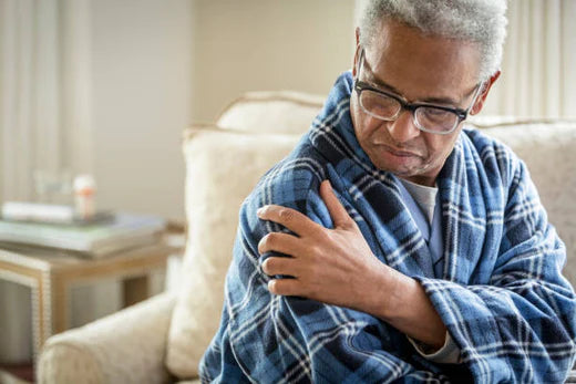old man experiencing a frozen shoulder