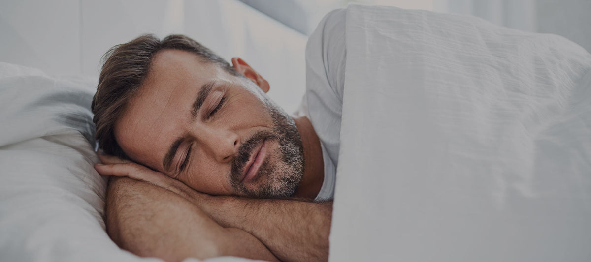 men peacefully asleep